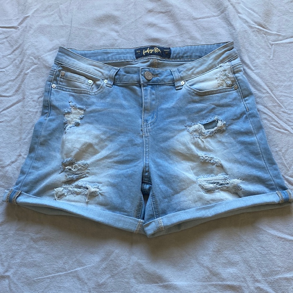 light wash ripped jean shorts